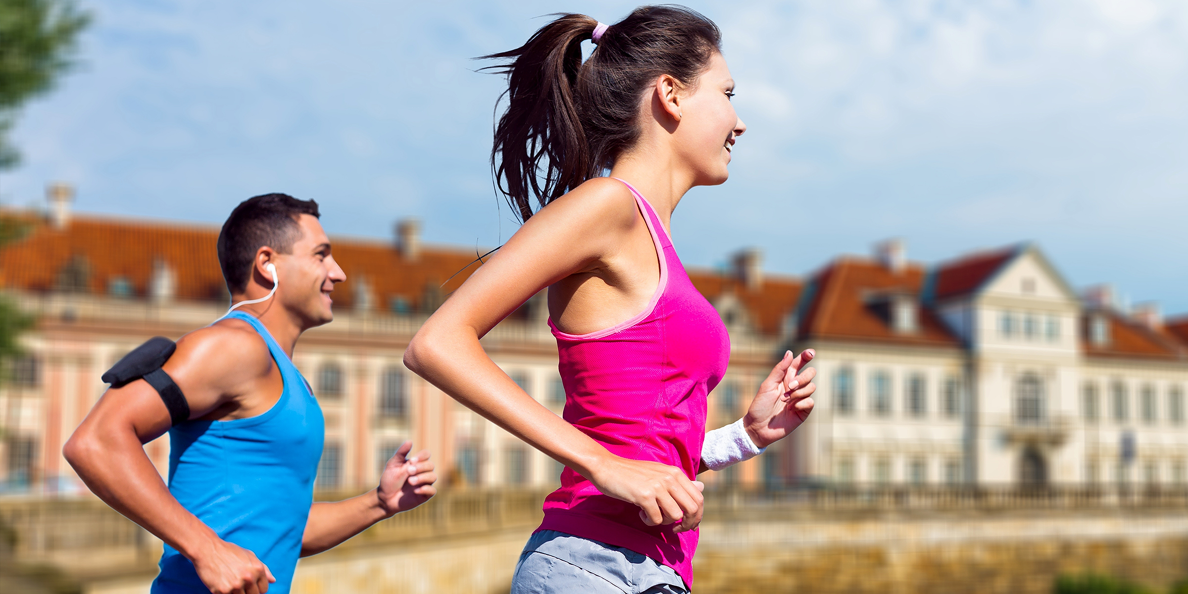 Two people run outdoors | Source: Shutterstock