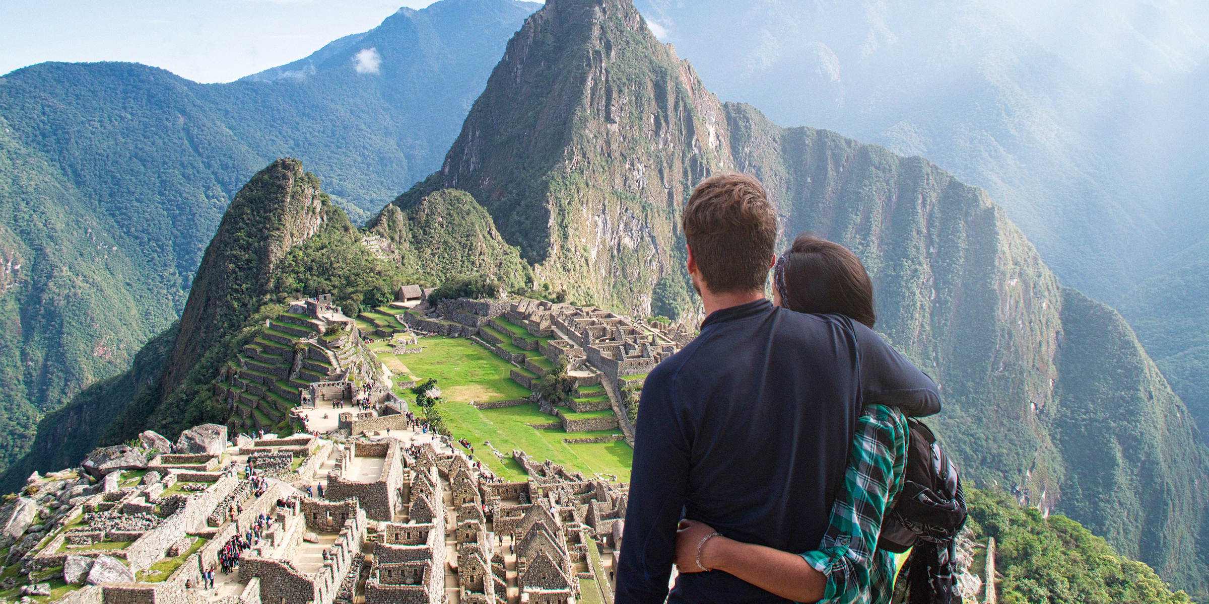 A couple overlooking Machu Picchu | Source: Shutterstock