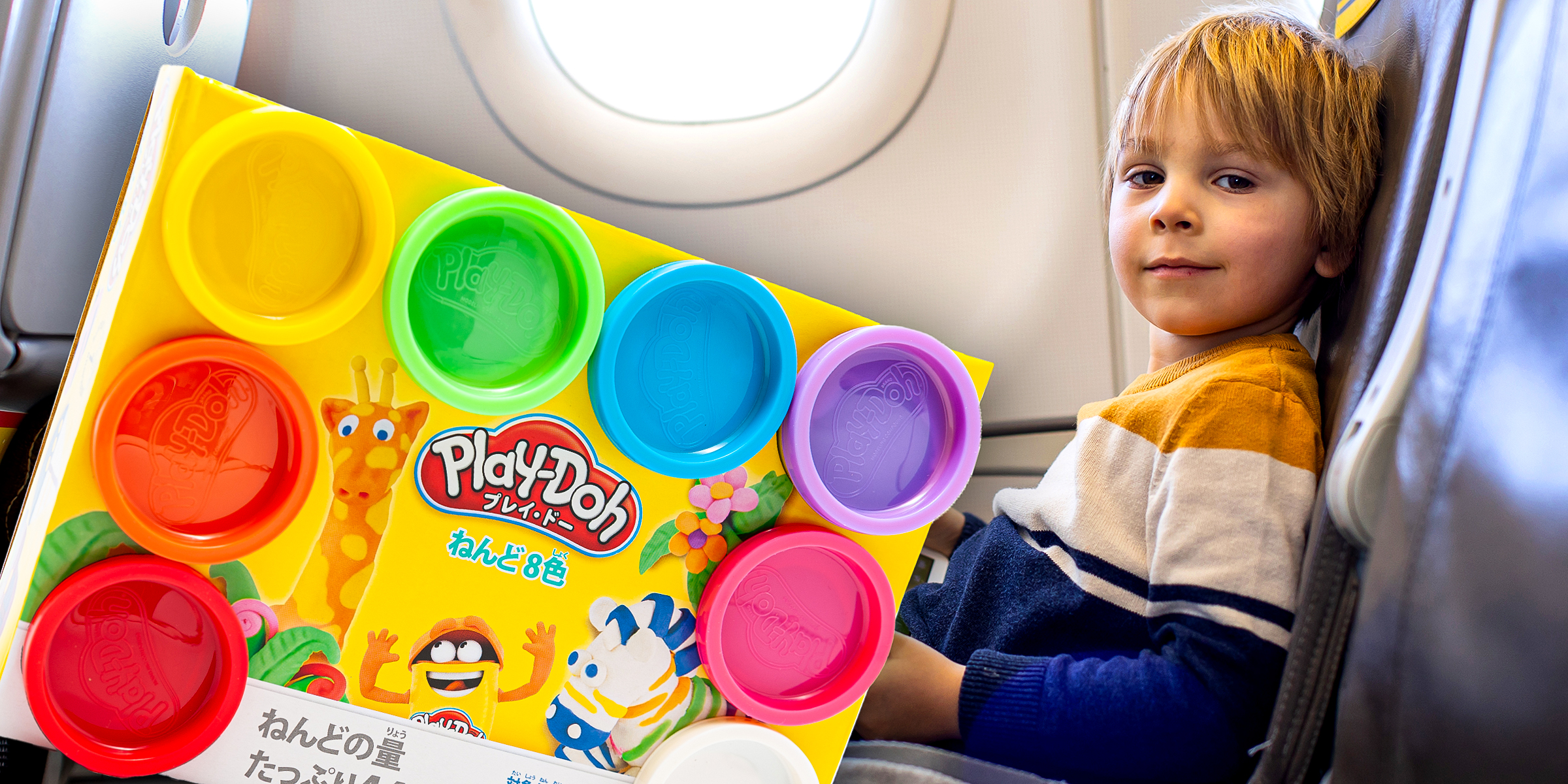 A Play-Doh | A child on the plane | Source: Shutterstock