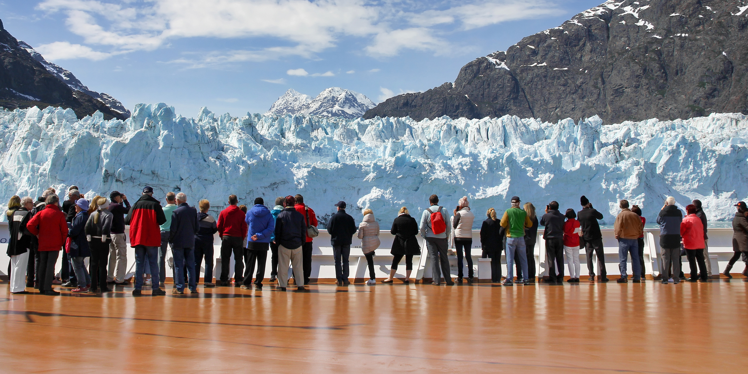 People gazing at a glacier in Alaska | Source: Shutterstock